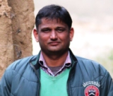 Chemistry professor conducting laboratory research